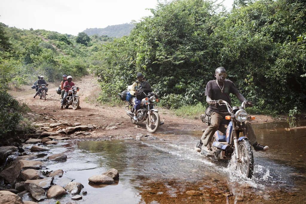 Decent of the Fouta Djallon highlands of Guinea by motorcycle taxis from the source of the River Gambia to Kedougou, Senegal